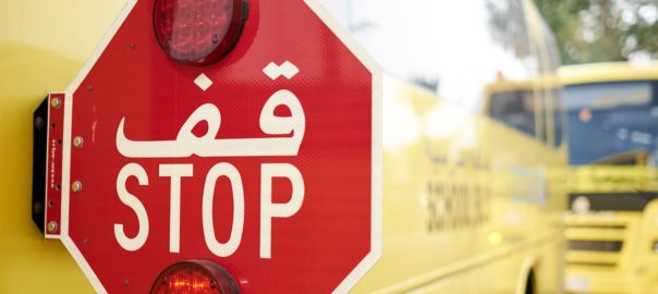 Stop sign on a dubai school bus